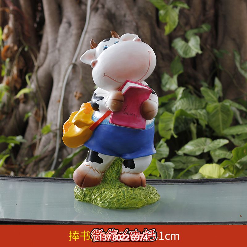 玻璃鋼雕塑牛，伴你一起看書，營(yíng)造完美草坪